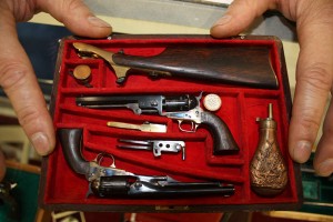 "Colt Army"- Model 1860 engraved barrel, detachable shoulder stock, cap box, bullet mold. "Colt Navy" _ Model 1851, engrv. barrel, powder flask, cap box, bullet mold, nipple wrench.