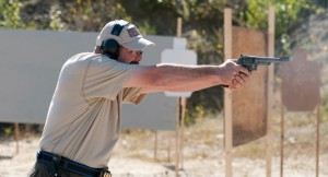 Craig Buckland shooting a revolver