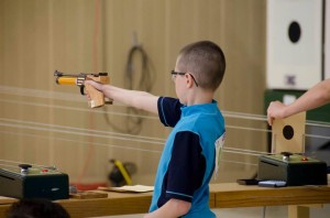 A young Junior Olympic competitor takes aim in 10m Air Pistol during the 2012 NJOSC.
