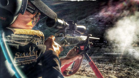 Dianna Liedorff taking a long range shot at the FTW Ranch in Texas. Photo Credit: Ryan Muller and Dianna Liedorff